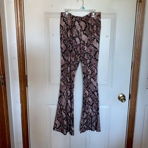 Form fitting snakeskin print pants